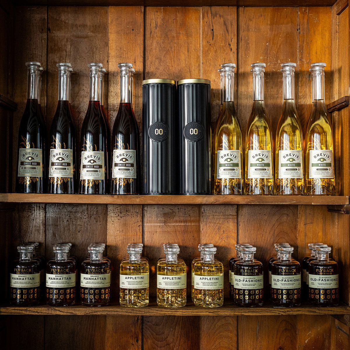 Klocke Estate bottles: Brevis Sweet Red, Brandy 00, Brevis White, and Flyback coctkails